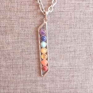 Chakra Pendant Necklace on Long Silvertone Chain - Pre-loved (27")
